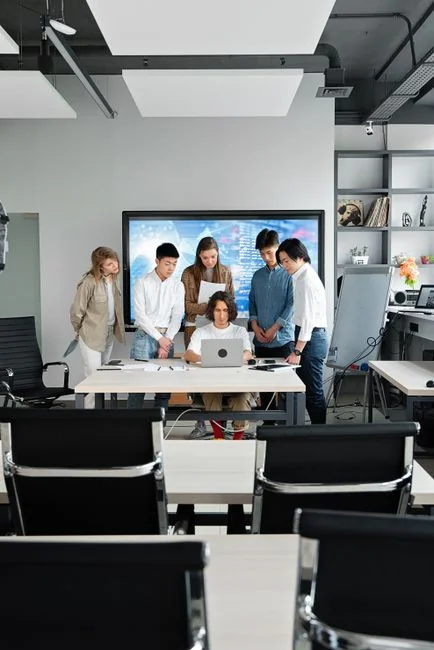 A modern computer screen displaying web design work, showcasing creative visuals in a workspace.